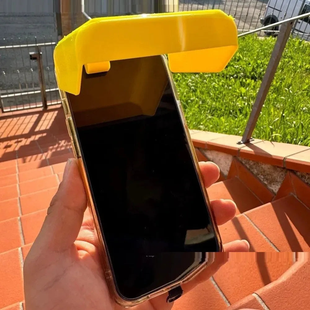 Yellow and black plastic phone sunshade with a clip-on holder for smartphones.