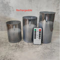 Set of three LED electronic candle lights in gold, gray, and white electroplated glass, sizes 7.5x10cm, 7.5x12.5cm, 7.5x15cm, with a remote control and USB cable.