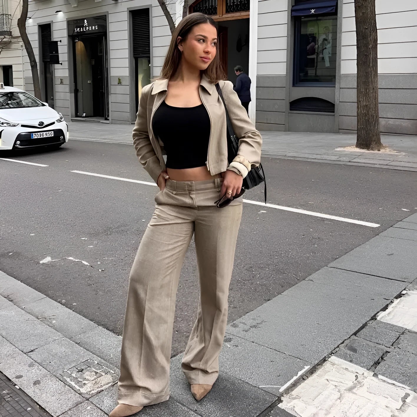 Women's herringbone pattern suit set with 3D embroidery, showing the long-sleeve coat and straight-leg trousers.
