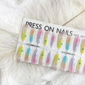 Dopamine Cartoon XINGX oval almond nail sticker set in sweet XB11-880 colour, natural frosted non-sealing layer, on a woman's nails.