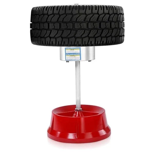 Portable aluminium hub balancer with bull's eye level on an enamel-finished base for tyre balancing.