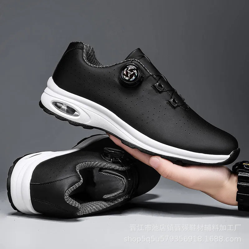 Black and white low top casual tennis shoes with cross shoulder straps and mesh upper.