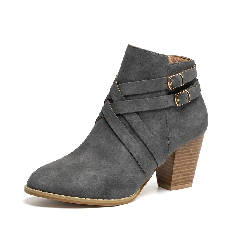 Women's black PU leather short boots with a side zipper and a 7cm thick chunky heel.