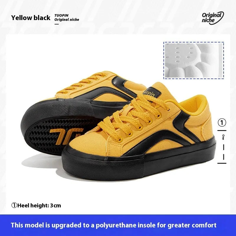 Minority women's low top board shoes in black and white colourway, synthetic leather upper, round toe.