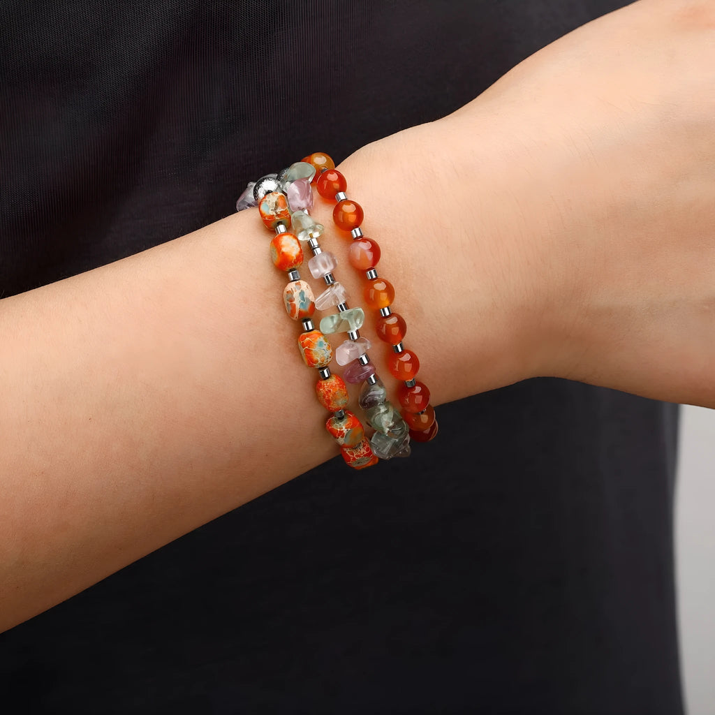 Red agate hand-woven bracelet with geometric beads and texture design