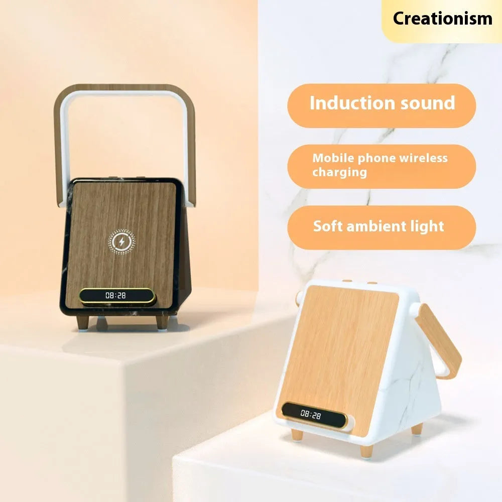 Wireless charging induction Bluetooth speaker small night lamp in Platinum Jazz finish on a wooden surface.