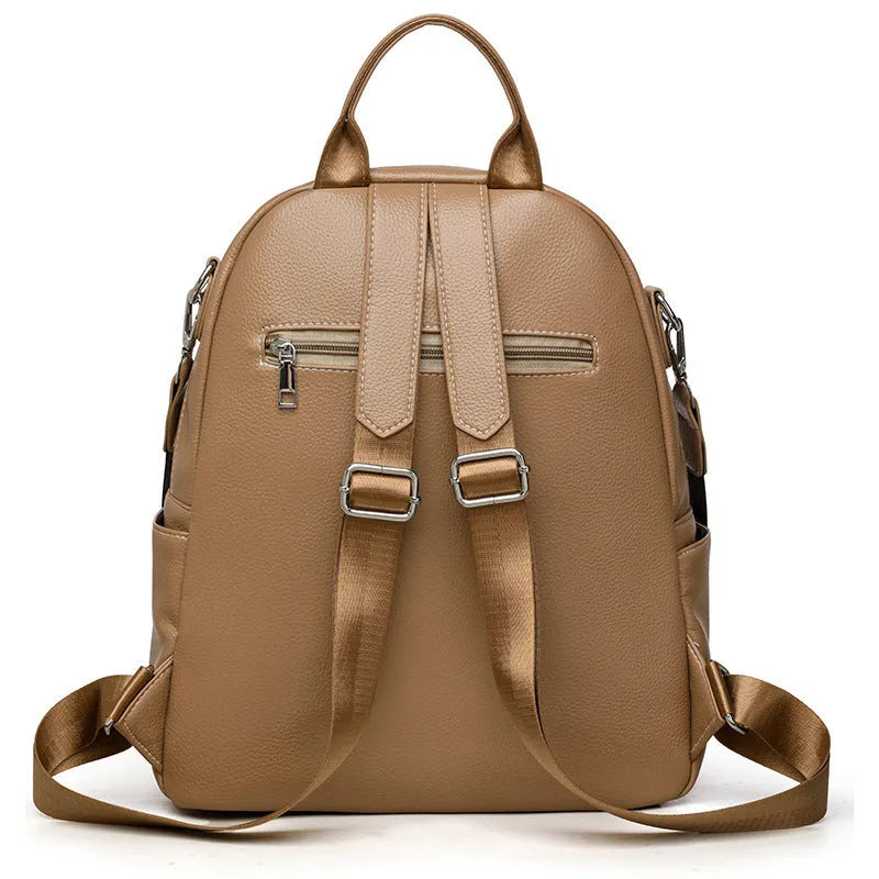 Genuine leather tassel backpack in khaki with fringe, stitching, anti-theft zippered hidden pocket and phone pocket