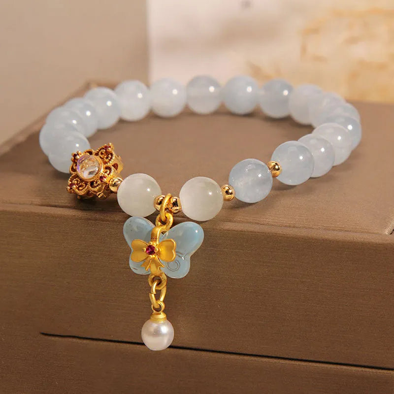Women's crystal bracelet with butterfly pendant and aquamarine rhinestones