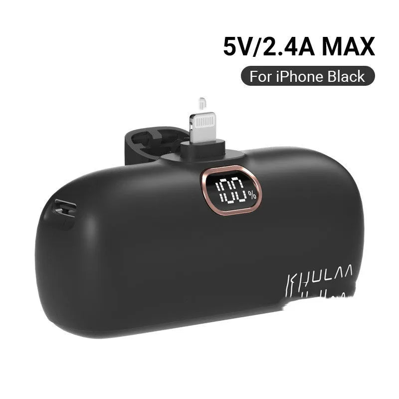 Compact cylindrical alloy power bank with built-in charging cable and LCD digital display.