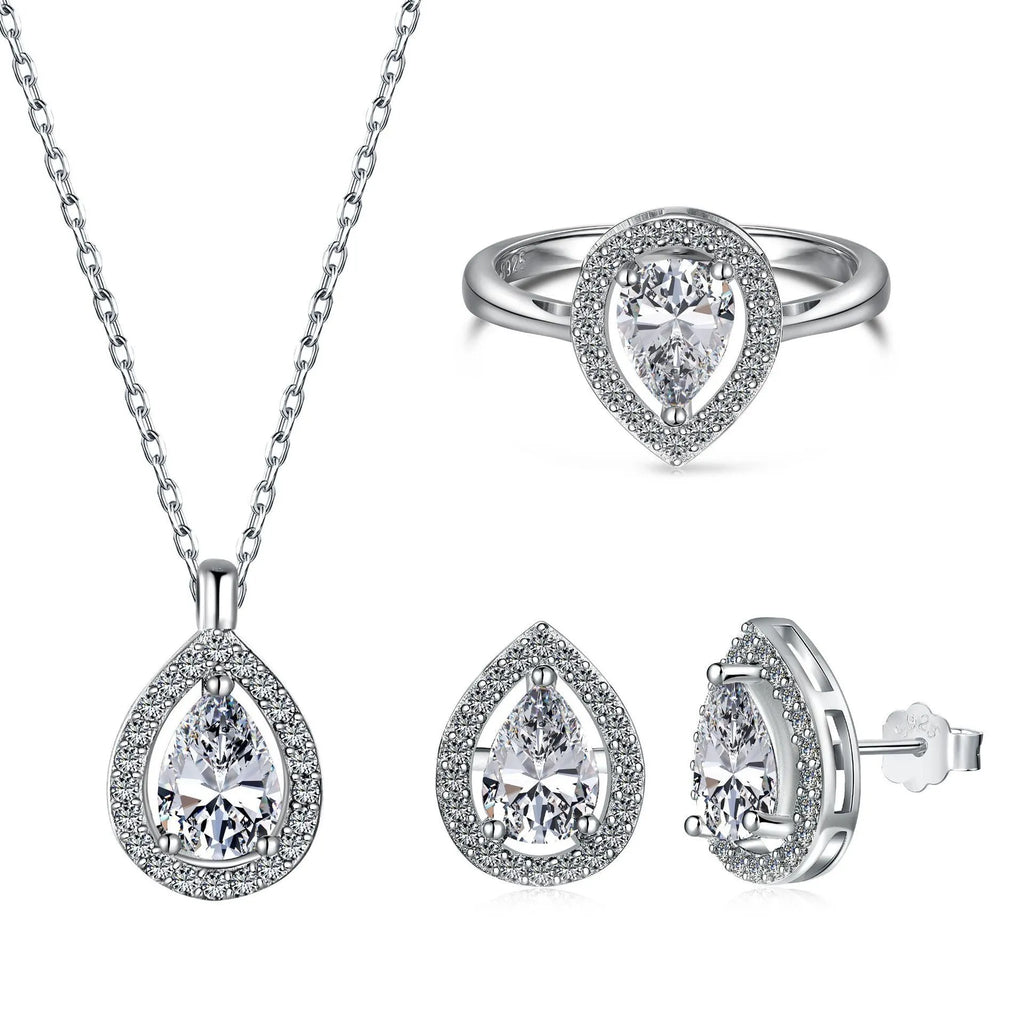 S925 sterling silver ring with drop-shaped diamond zircon stone in light luxury style on a plain background
