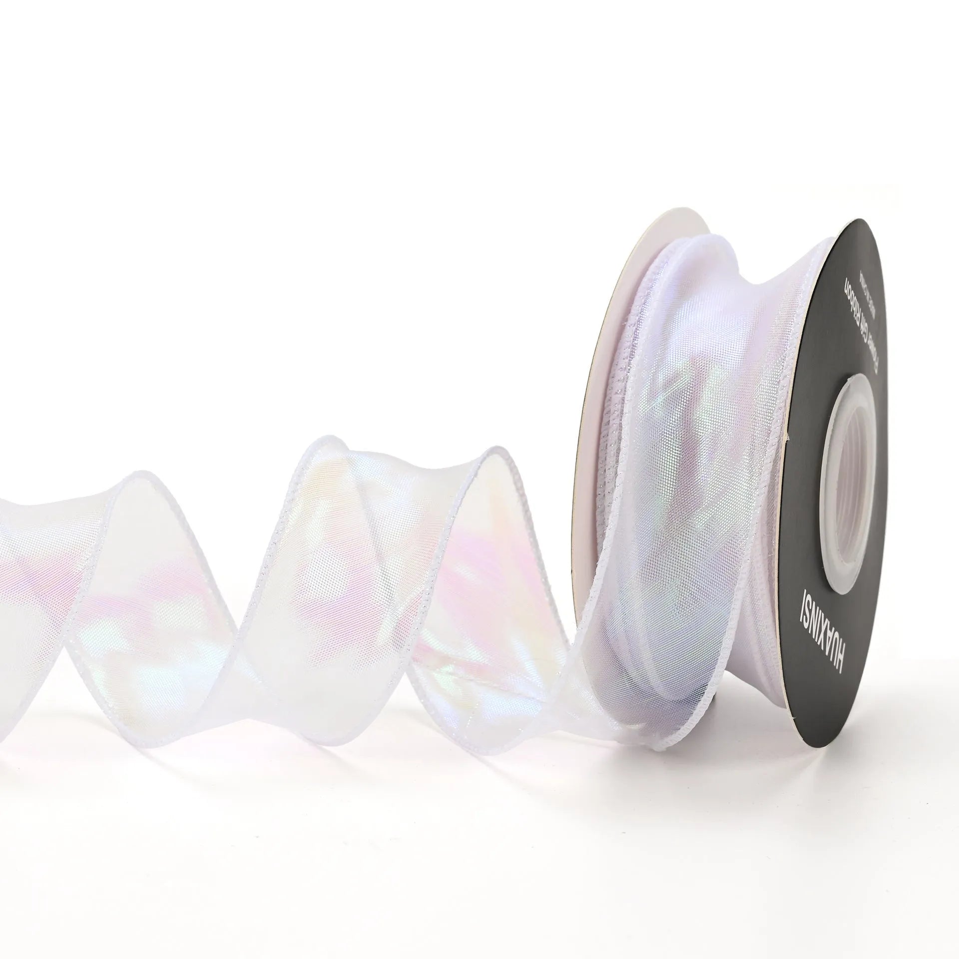 Roll of colourful wave patterned fishtail yarn decorative ribbon in mesh material, 4cm wide.
