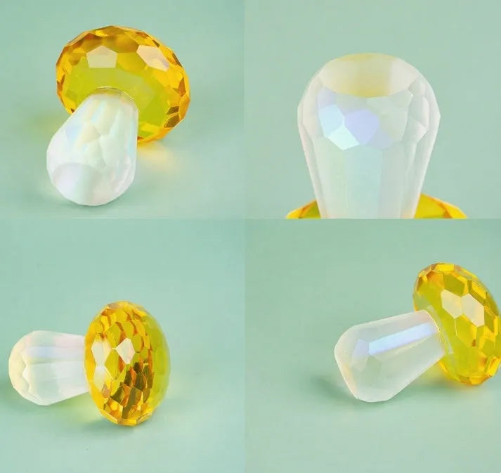 Modern geometric crystal mushroom decoration in transparent, green, red, or yellow, 40 by 53 millimetres.