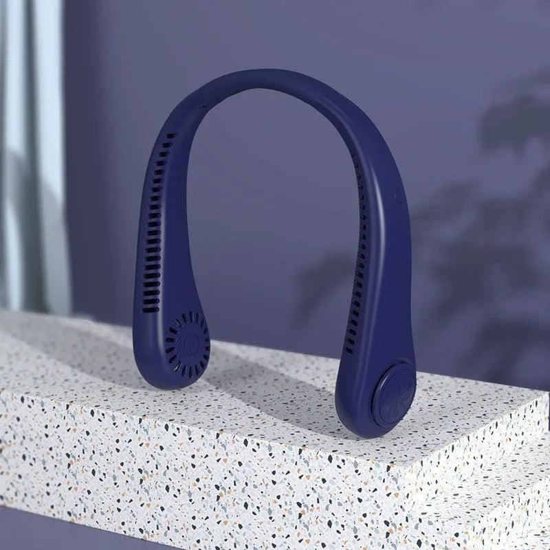 Pink USB rechargeable portable bladeless neck fan being worn.
