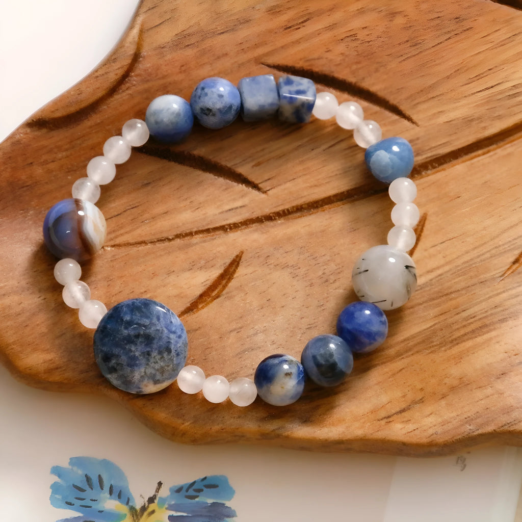 Hand-woven natural blue point stone and black hair crystal agate bracelet with geometric design