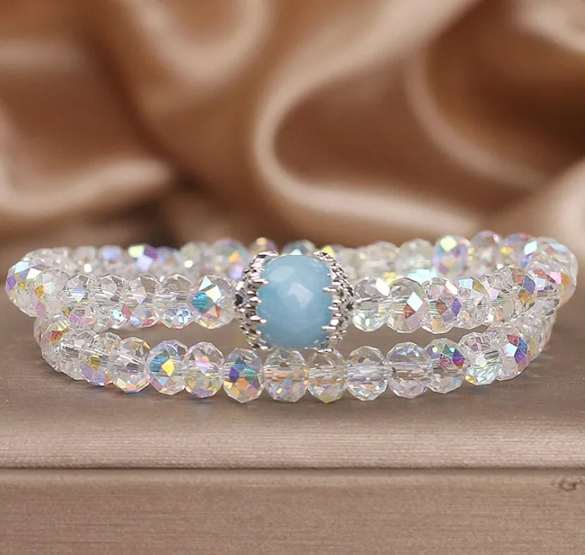 White crystal double ring bracelet for women with electroplated finish on light background