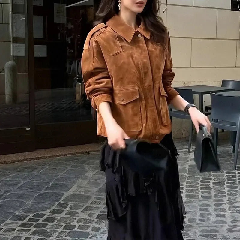 Women's brown suede-effect street chic coat with regular sleeves on a hanger