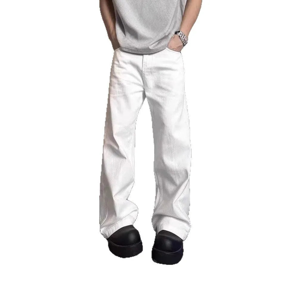 Men's white loose straight-leg wide-leg denim jeans on a mid-waist with a zipper fly.