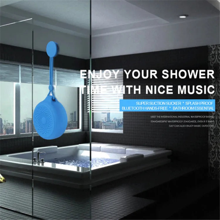 Compact Bluetooth speaker with suction cup base in black, blue and pink options