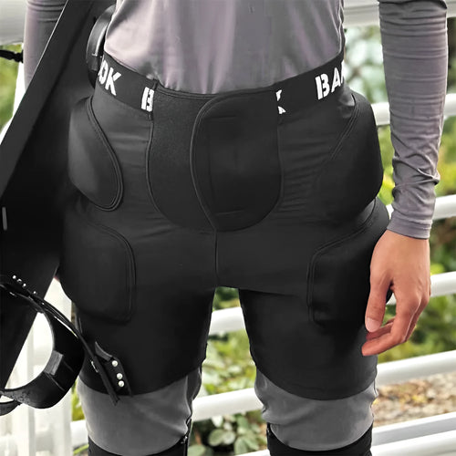 Black adult roller skating hip protection shorts with integrated NBR foam armour panels.