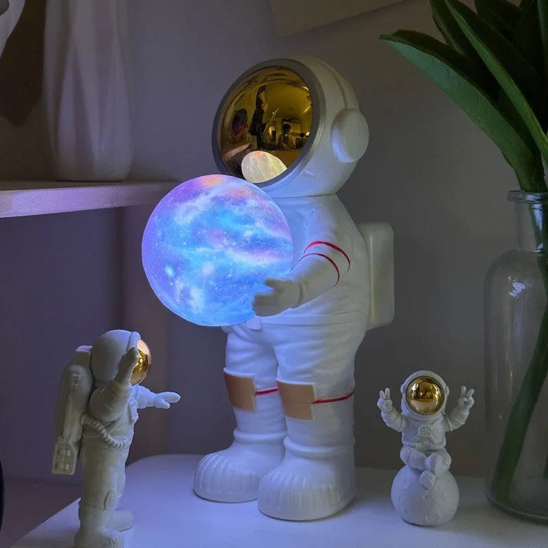 Spaceman starry sky projection lamp showing adjustable lighting patterns and compact design