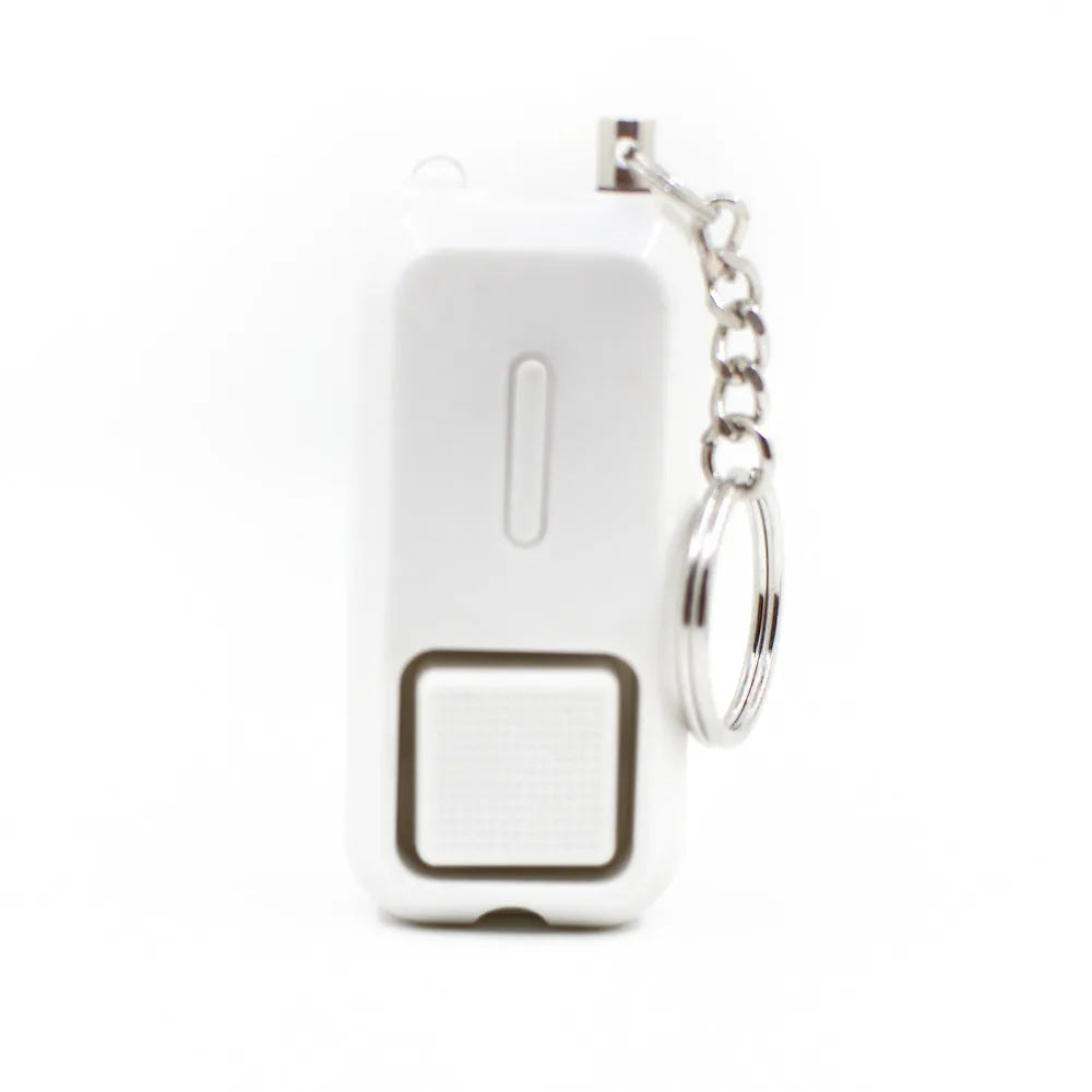 Personal safety alarm measuring 65x30x12mm in pink colour with 130dB sound