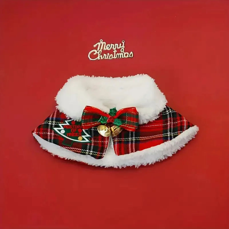 Red festive dog scarf with bell pattern tied around a pet's neck for Christmas.