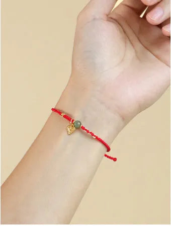 Handmade 925 silver and Hetian jade woven bracelet for women with red strap