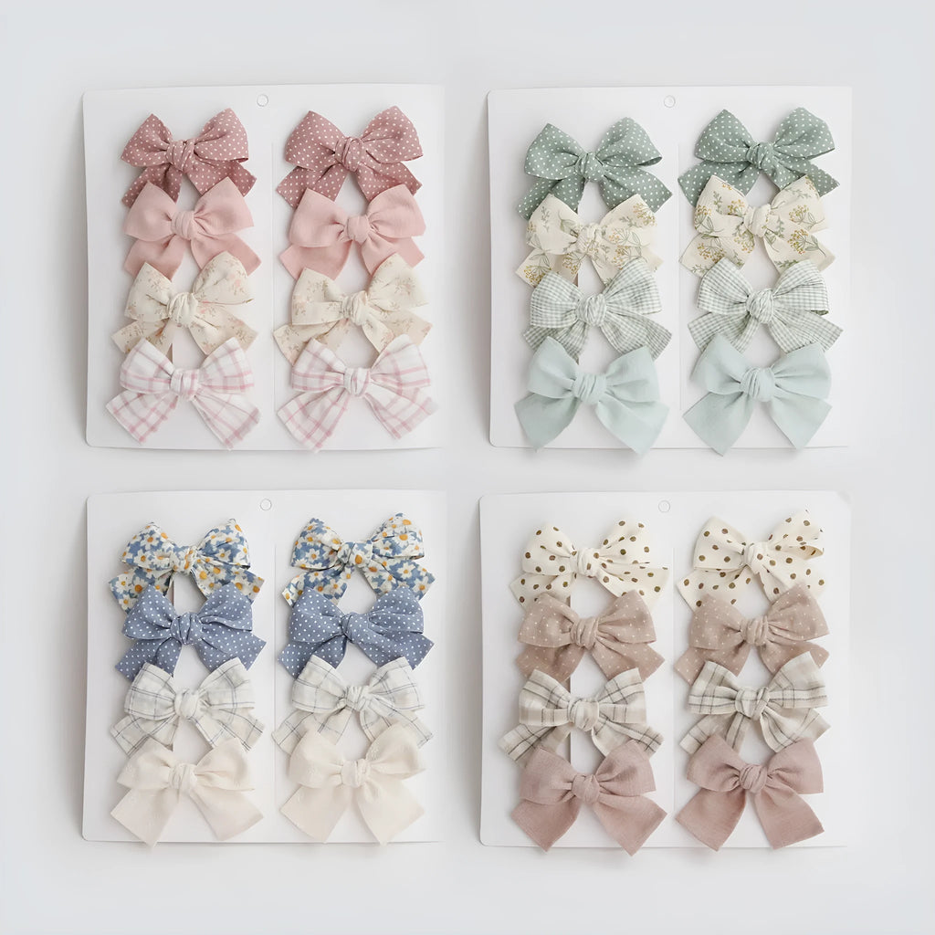 Dovetail bow hairclip set for children in cloth material with eight colour options