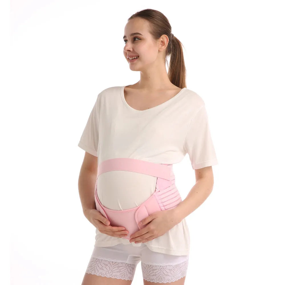 Adjustable pregnancy support belt with Velcro closure in various colours wrapped around abdominal area