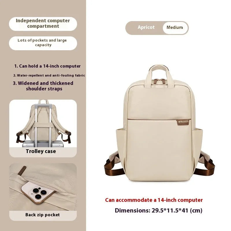 Large canvas travel backpack for women showing multiple internal compartments and zippered pockets