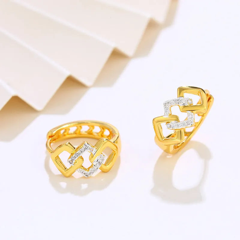 Geometric hollow-out gold-colour alloy earrings with ear clip fastening