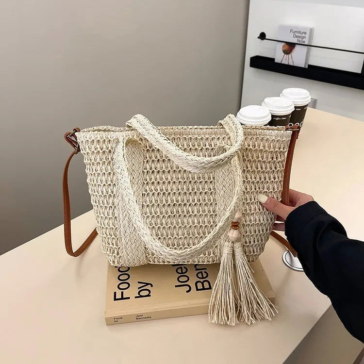 Women's straw crossbody shoulder bag in milky white colour with woven texture