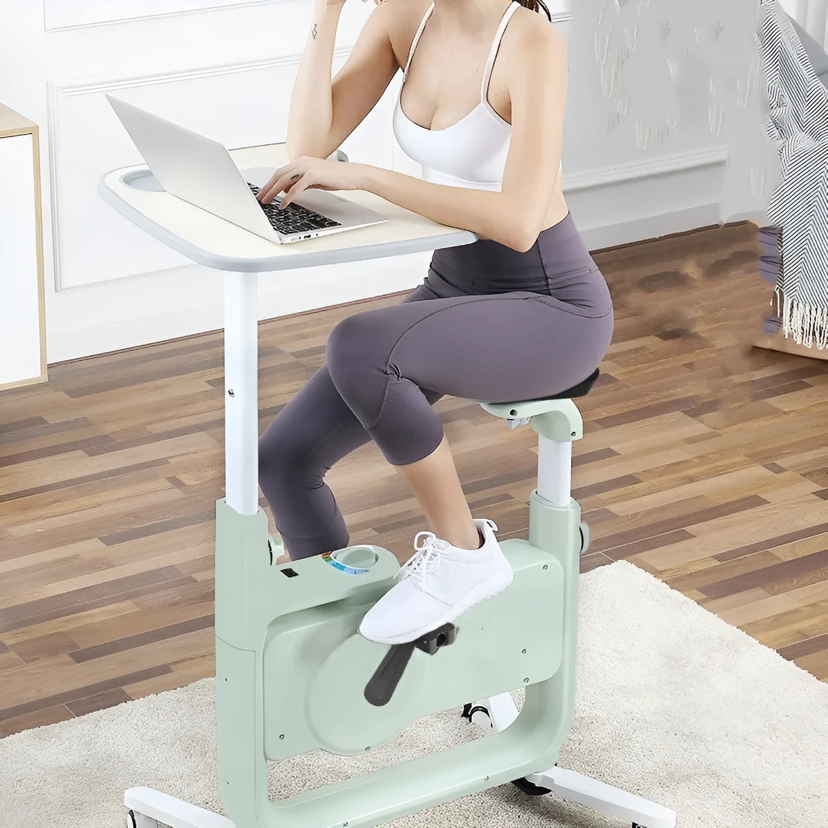Small upright magnetic desk exercise bike with belt drive flywheel in apple green and cool black colour options