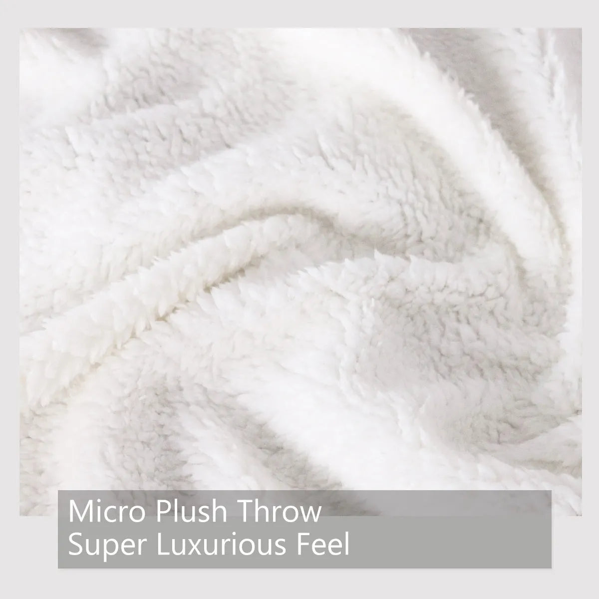 Brown ferret paw print sherpa fleece blanket measuring 130x150cm, folded on a sofa