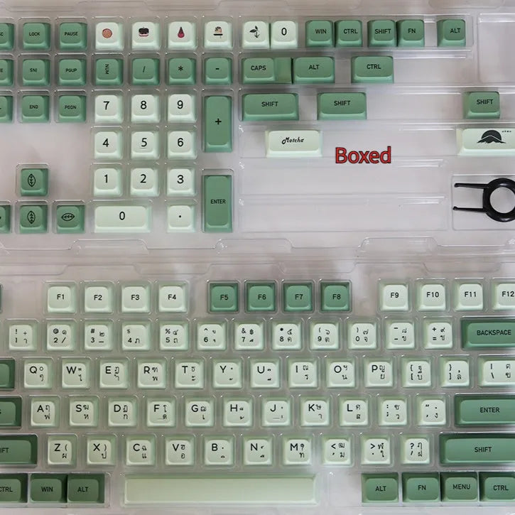 124 PBT dye-sublimation keycap set in matcha green colour on a keyboard.