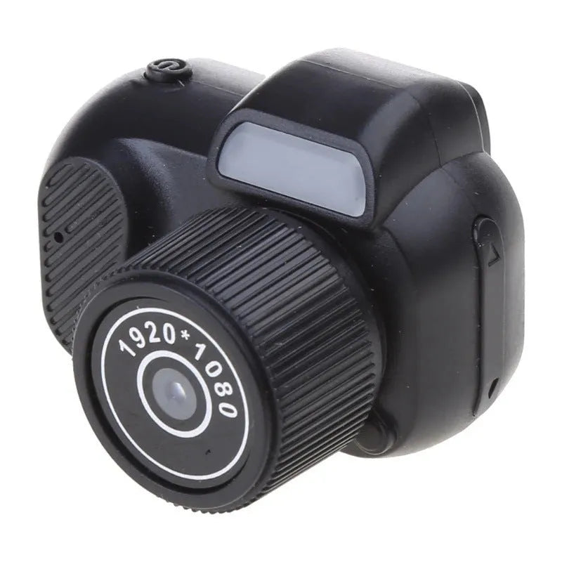 Black retro mini video camera with built-in screen showing 1080p HD recording