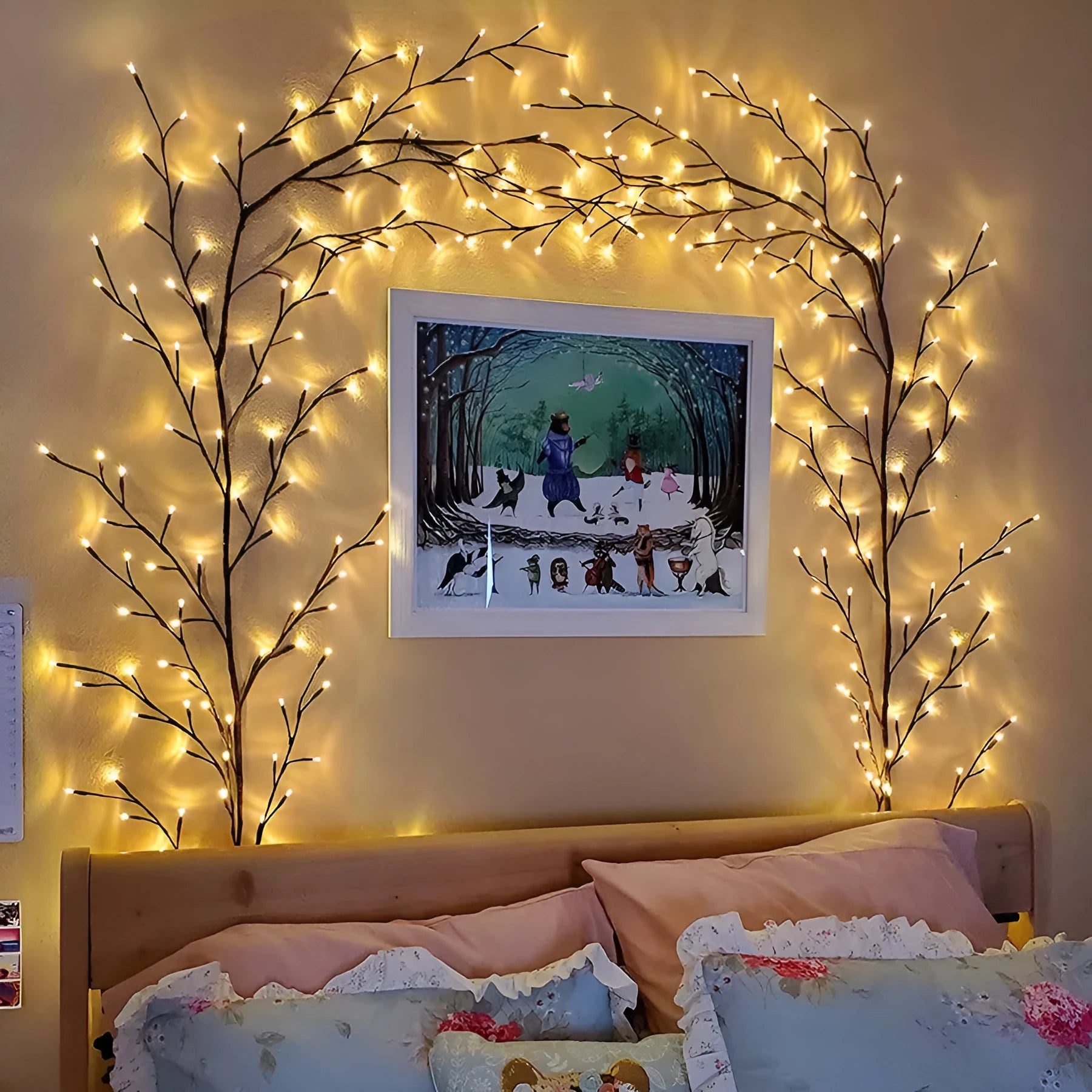 Flexible white birch texture LED vine garland with warm white lights bent into a decorative shape.