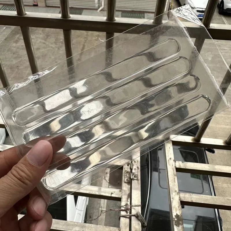 Transparent 3D car door handle protection stickers applied to vehicle door handles