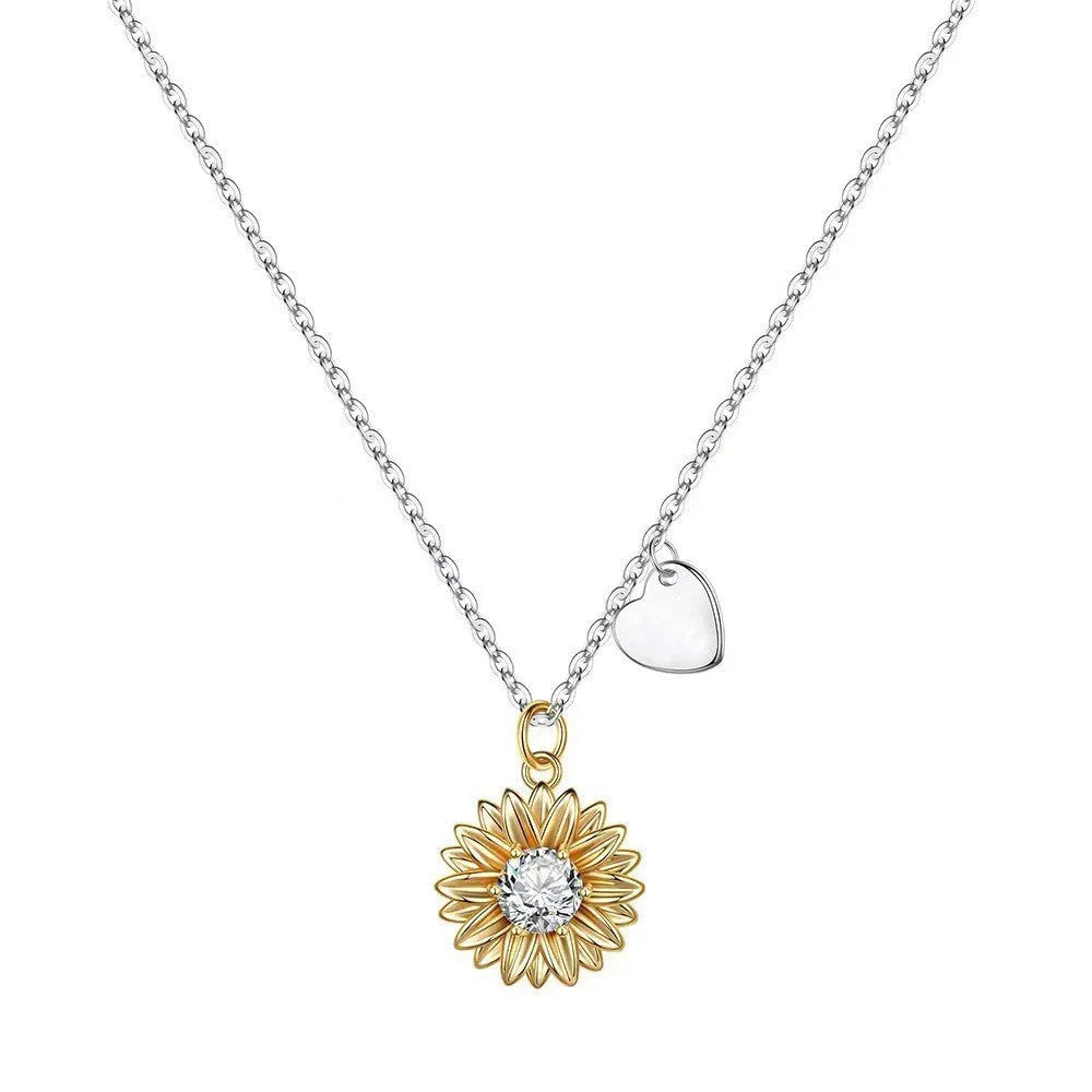 925 silver sunflower and daisy pendant necklace with an adjustable cross chain, shown at 21-50cm length.
