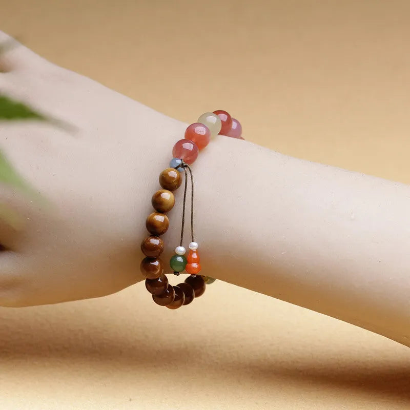 Handmade 8mm agate bracelet with diamond-shaped beads in natural persimmon colour tones