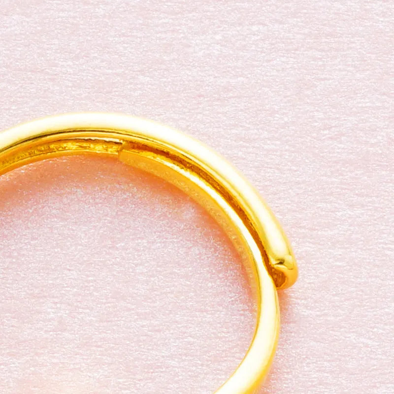 Adjustable Vietnam placer gold zircon ring for women in six colour options on a white background.