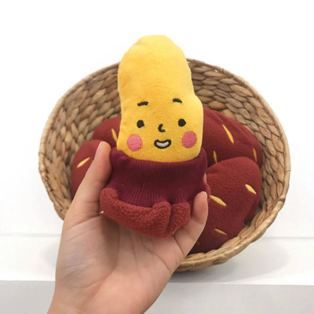 Red sweet potato shaped dog puzzle toy with hidden treat compartments