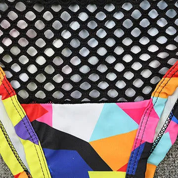 Women's checkered multicolour bikini set with cross-strap fishnet top and high-waist briefs.