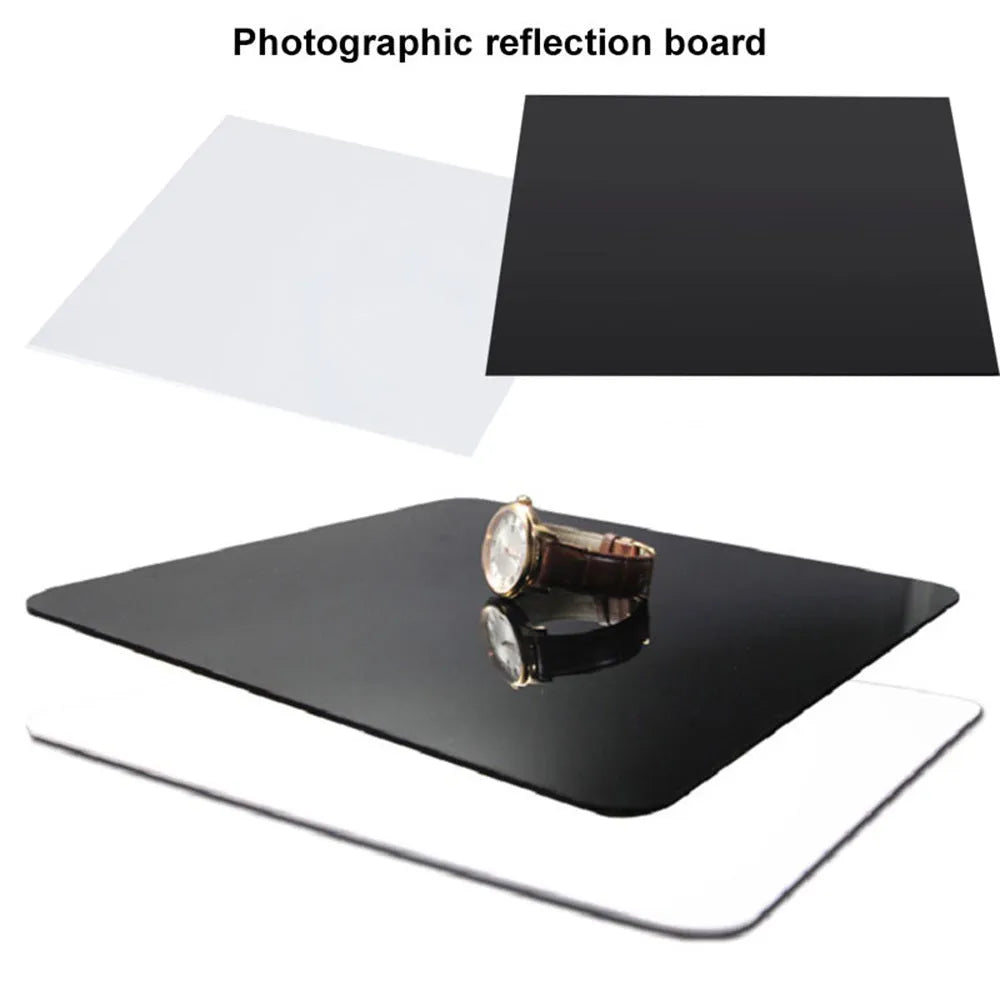 Square black and white acrylic reflection boards for photography in three different sizes.