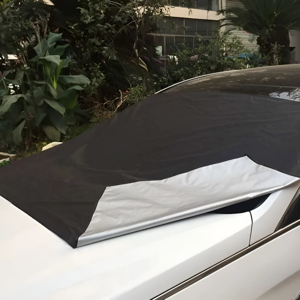 Magnetic car windshield cover with 6 magnets, black and silver, 210x125cm on a car windshield for snow protection