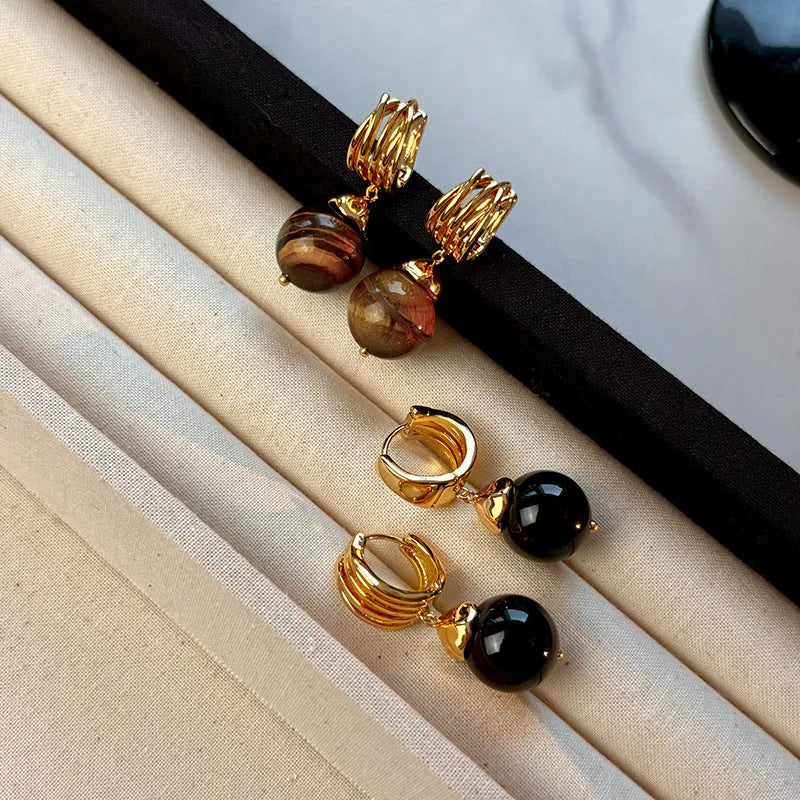Geometric tigereye stone earrings for women with gold plating in brown and black colour options.
