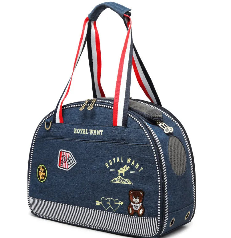Blue denim Japanese-style pet carrier bag with cartoon pattern, dimensions 43x20x30cm.