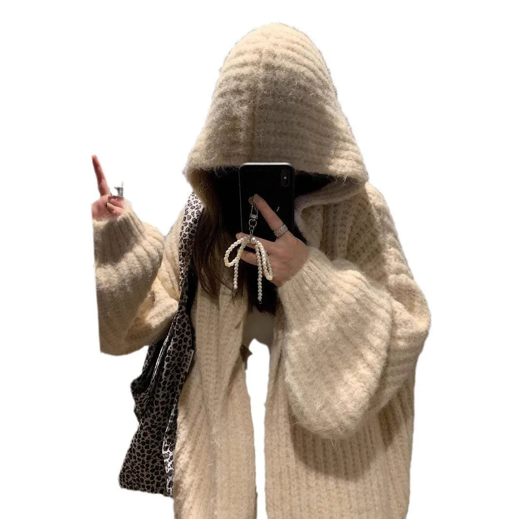 A woman's brown retro-style hooded cardigan with a loose fit, made from thick acrylic-polyester fabric.