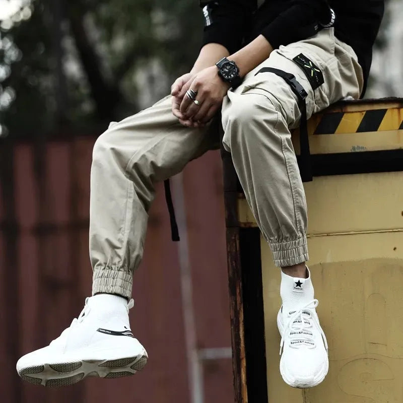 Men's cotton cargo pants in Khaki with multiple pockets, side view