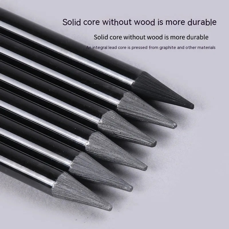 Set of nine drawing pencils with wooden shells, comprising six graphite and three carbonised pencils, on a suction card.